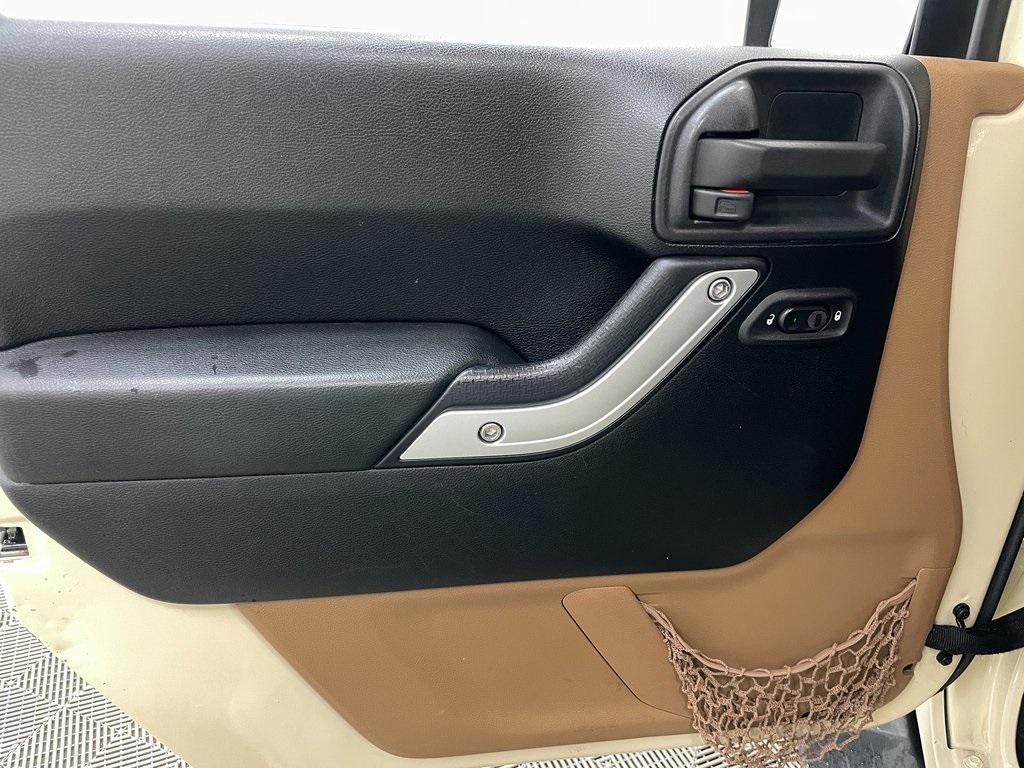 used 2011 Jeep Wrangler Unlimited car, priced at $12,999