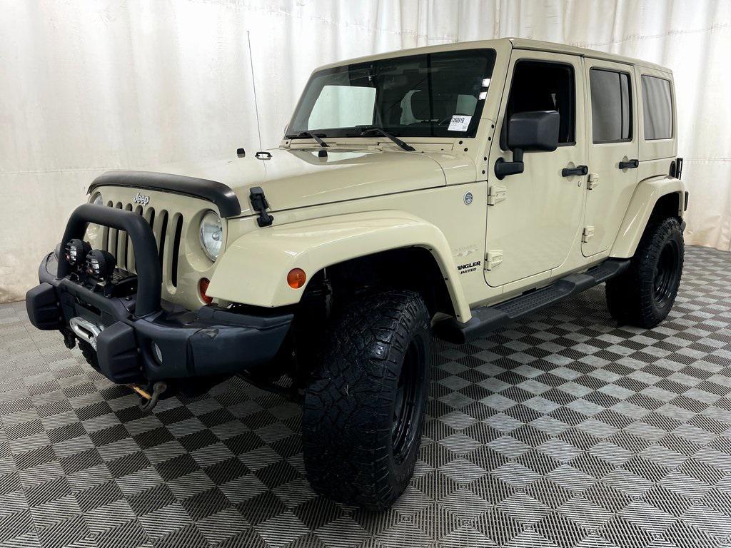 used 2011 Jeep Wrangler Unlimited car, priced at $12,999