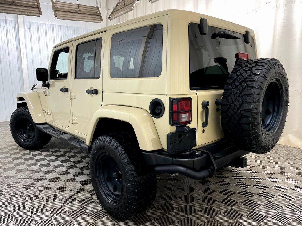 used 2011 Jeep Wrangler Unlimited car, priced at $12,999