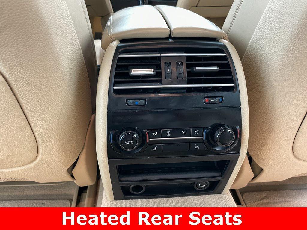 used 2015 BMW 750 car, priced at $13,799