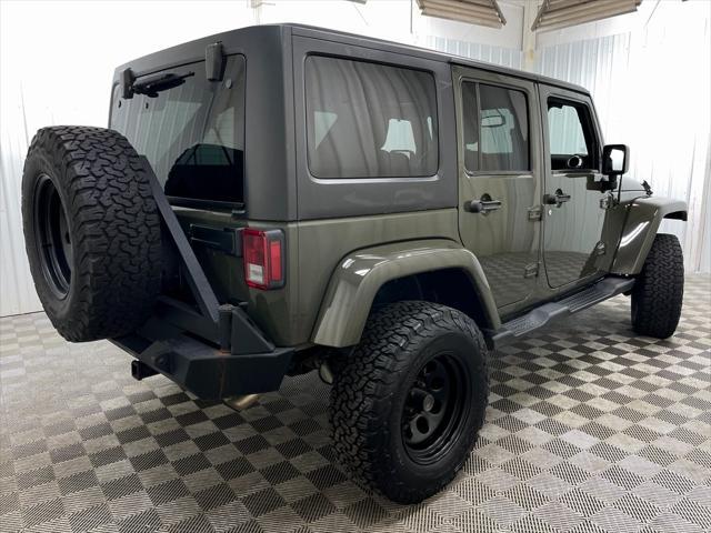 used 2015 Jeep Wrangler Unlimited car, priced at $16,495