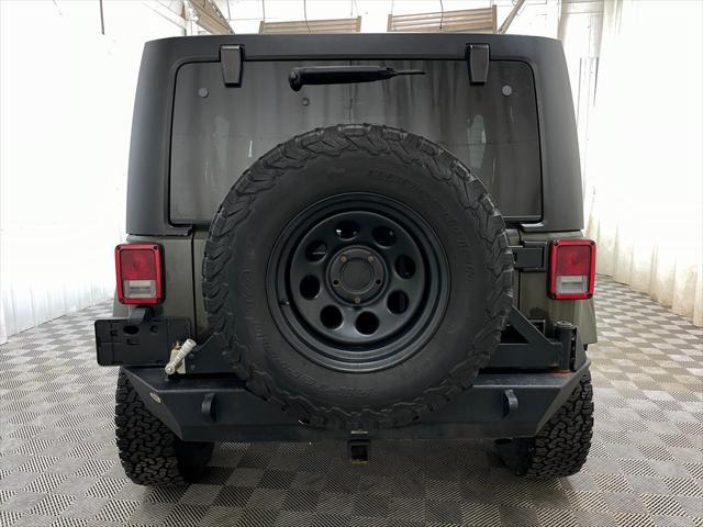 used 2015 Jeep Wrangler Unlimited car, priced at $16,495