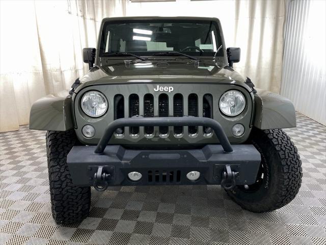 used 2015 Jeep Wrangler Unlimited car, priced at $16,495