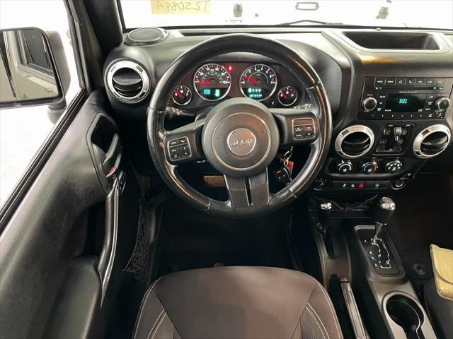 used 2015 Jeep Wrangler Unlimited car, priced at $16,495