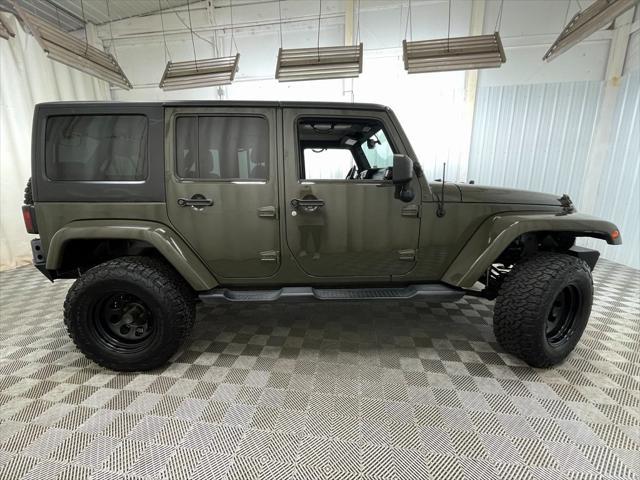 used 2015 Jeep Wrangler Unlimited car, priced at $16,495