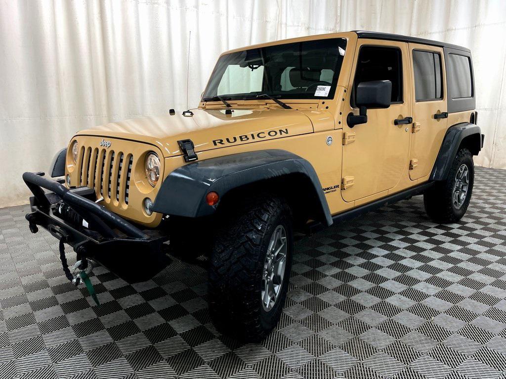 used 2014 Jeep Wrangler Unlimited car, priced at $16,839