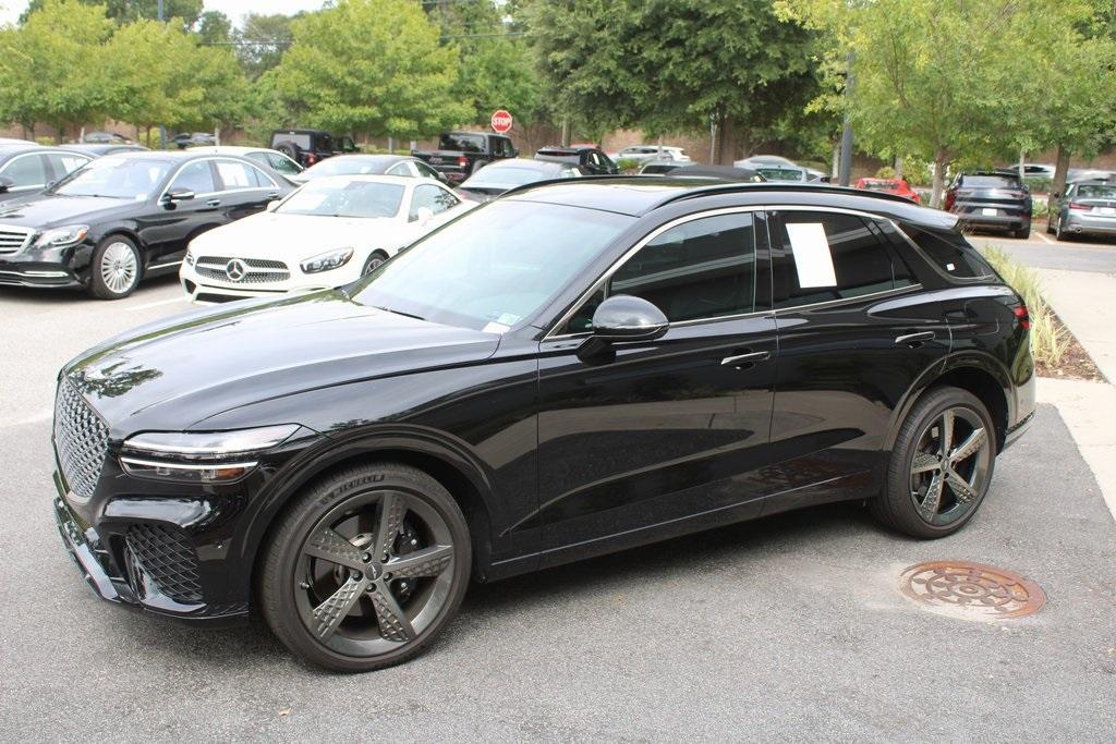 used 2024 Genesis GV70 car, priced at $55,555