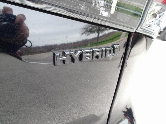 used 2024 Toyota Highlander Hybrid car, priced at $49,998