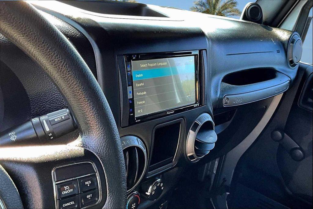 used 2013 Jeep Wrangler car, priced at $13,603
