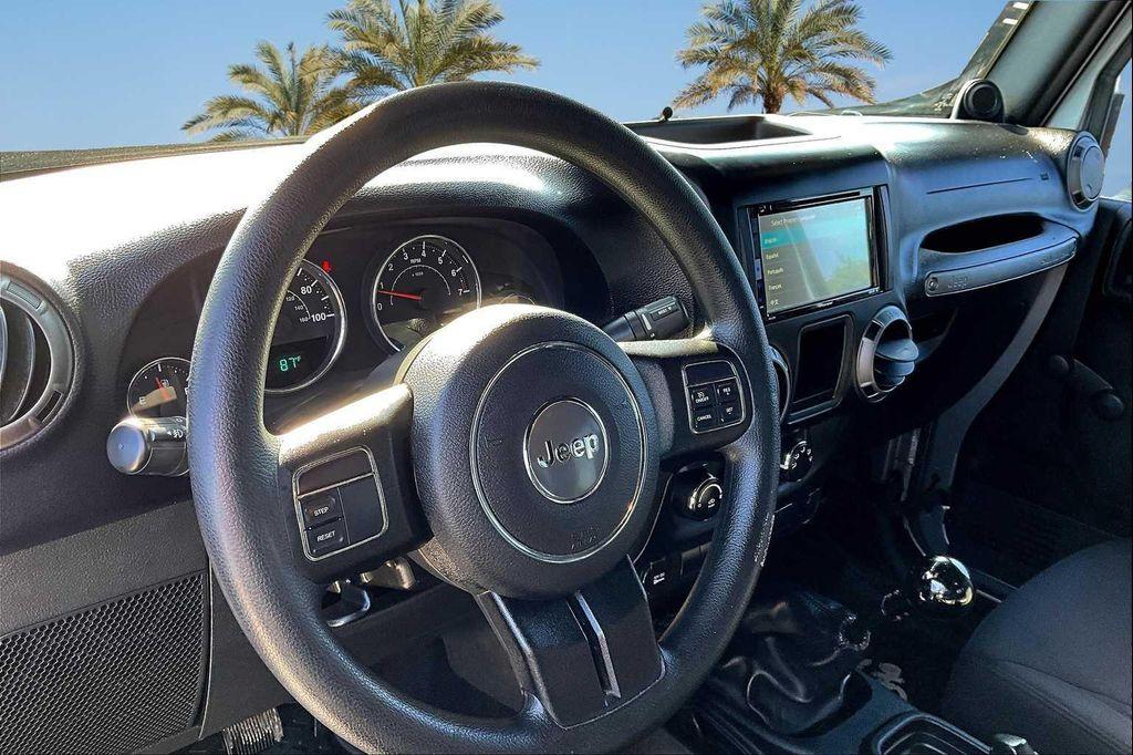 used 2013 Jeep Wrangler car, priced at $13,603