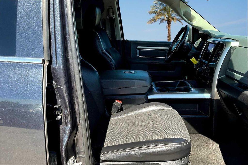 used 2018 Ram 1500 car, priced at $15,077