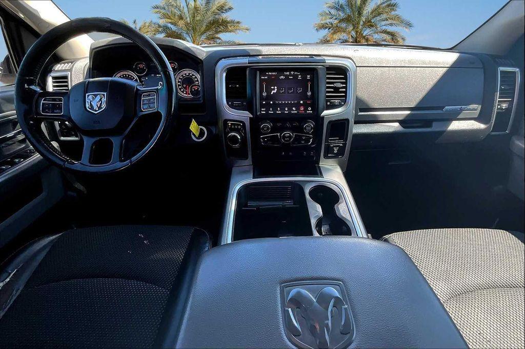 used 2018 Ram 1500 car, priced at $15,077