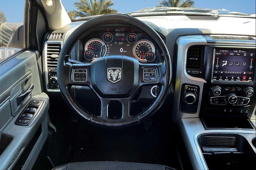 used 2018 Ram 1500 car, priced at $15,077