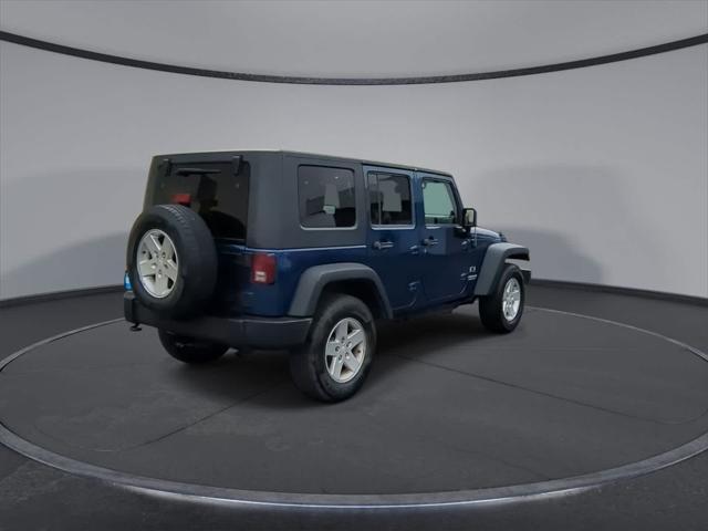 used 2009 Jeep Wrangler Unlimited car, priced at $14,992