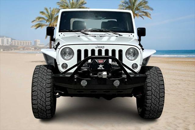 used 2015 Jeep Wrangler car, priced at $21,045