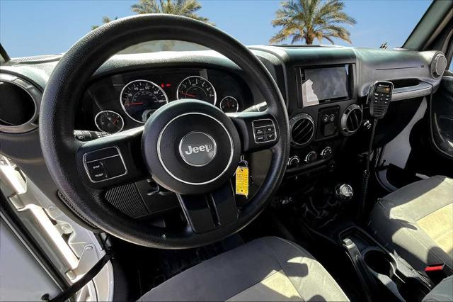 used 2015 Jeep Wrangler car, priced at $21,045