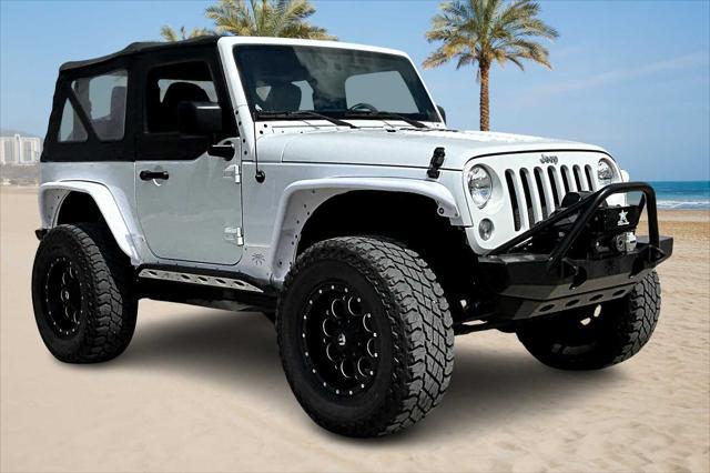 used 2015 Jeep Wrangler car, priced at $21,045