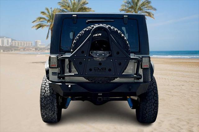 used 2018 Jeep Wrangler JK car, priced at $28,491