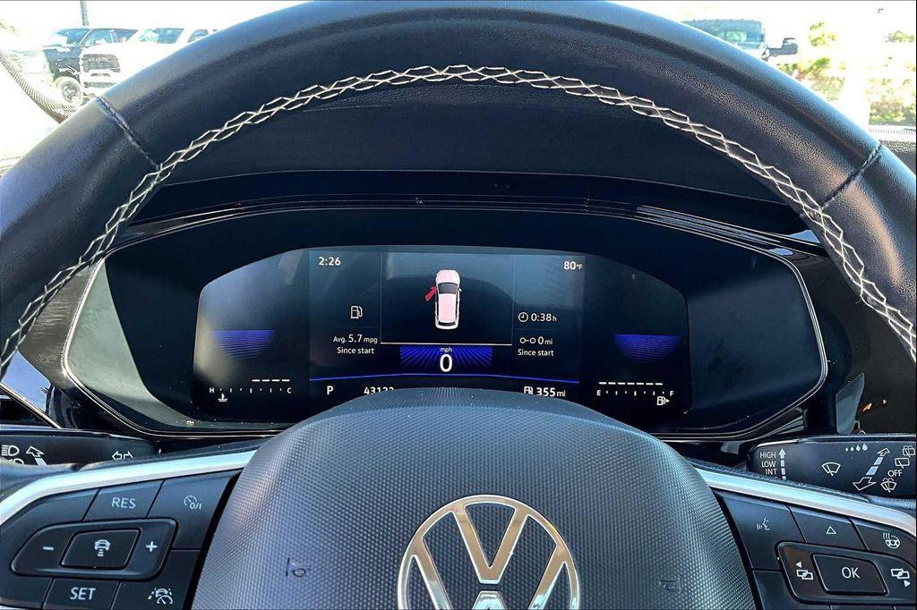 used 2024 Volkswagen Taos car, priced at $19,801
