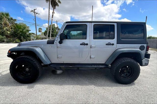 used 2016 Jeep Wrangler Unlimited car, priced at $21,301