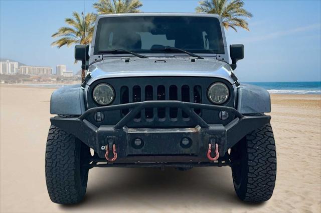 used 2016 Jeep Wrangler Unlimited car, priced at $21,301