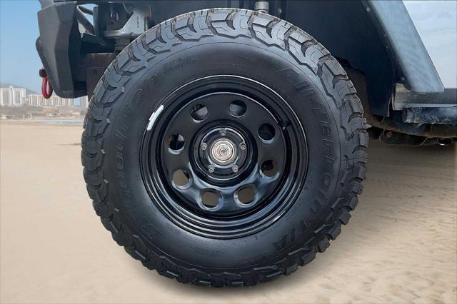 used 2016 Jeep Wrangler Unlimited car, priced at $21,301