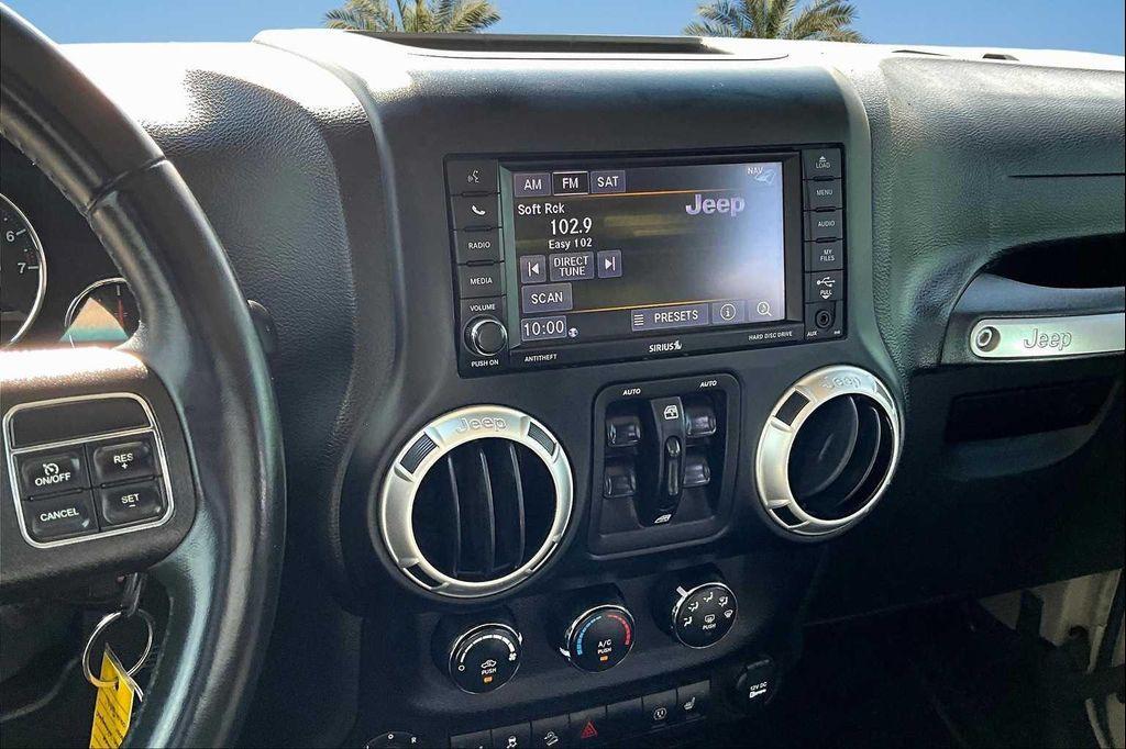 used 2018 Jeep Wrangler JK Unlimited car, priced at $22,735