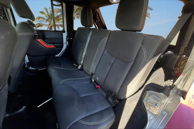 used 2015 Jeep Wrangler Unlimited car, priced at $17,922