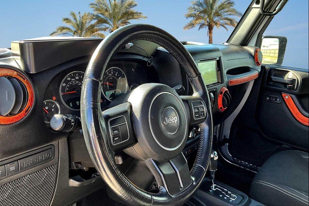 used 2015 Jeep Wrangler Unlimited car, priced at $14,998
