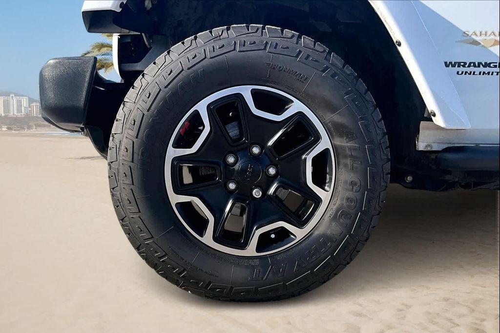 used 2014 Jeep Wrangler Unlimited car, priced at $16,388