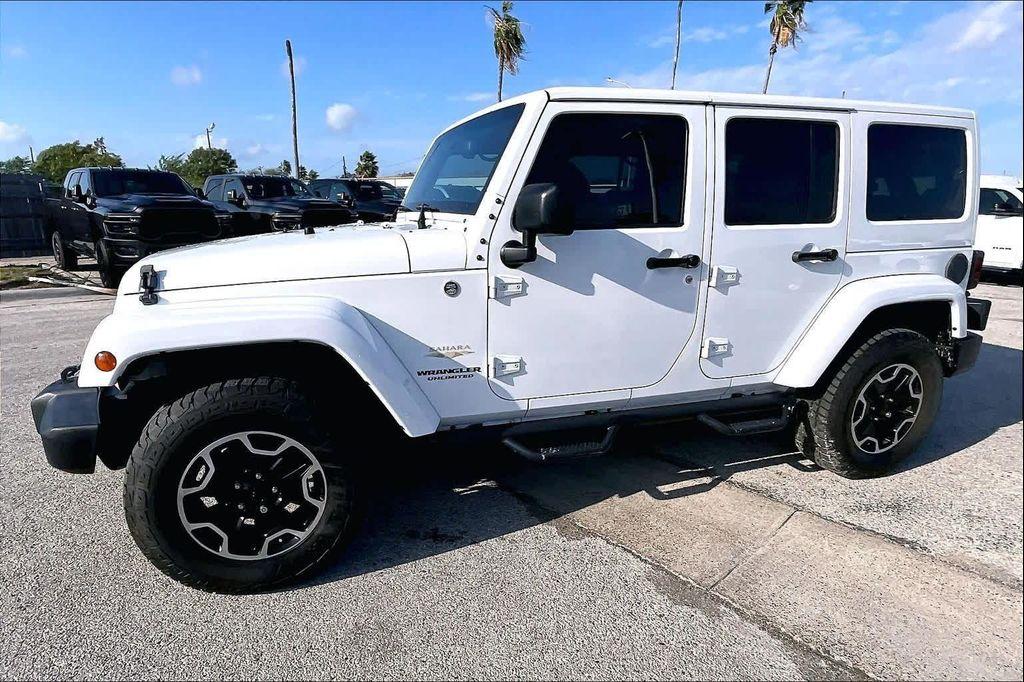 used 2014 Jeep Wrangler Unlimited car, priced at $16,388