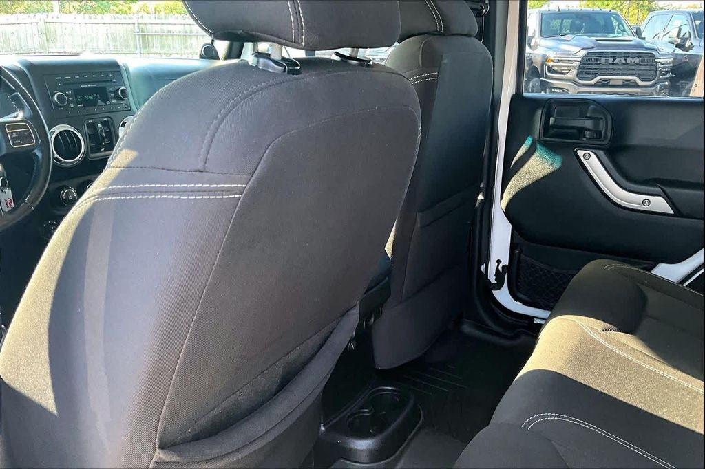 used 2014 Jeep Wrangler Unlimited car, priced at $16,388