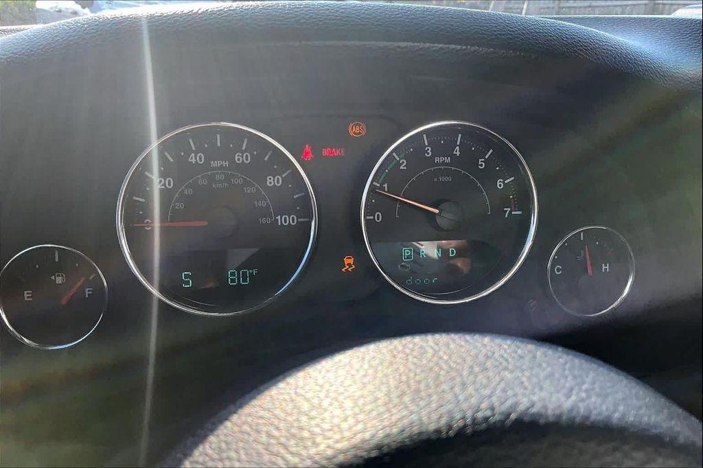 used 2014 Jeep Wrangler Unlimited car, priced at $16,388