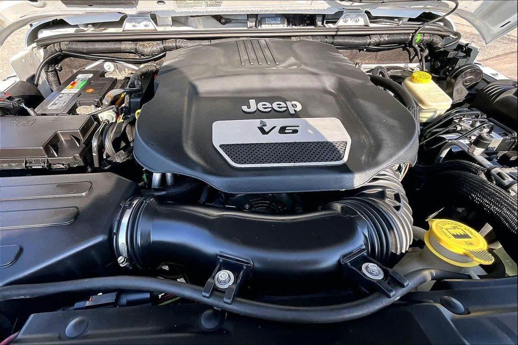 used 2014 Jeep Wrangler Unlimited car, priced at $16,388