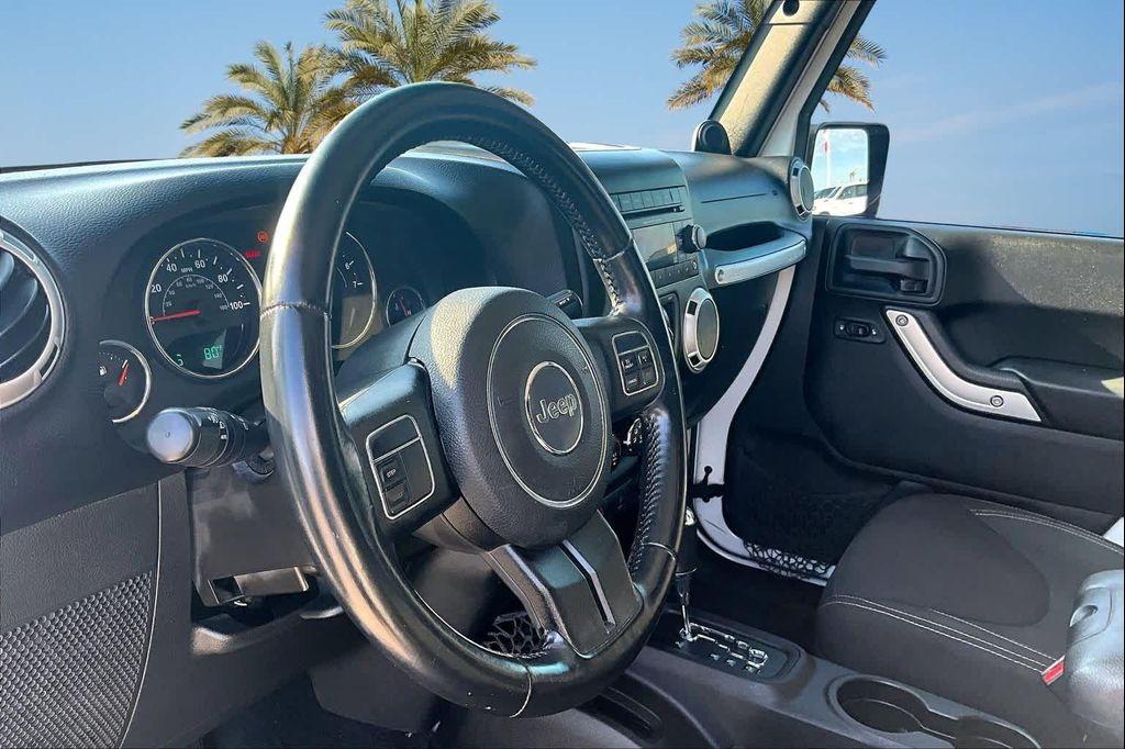 used 2014 Jeep Wrangler Unlimited car, priced at $16,388