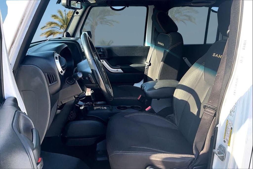 used 2014 Jeep Wrangler Unlimited car, priced at $16,388