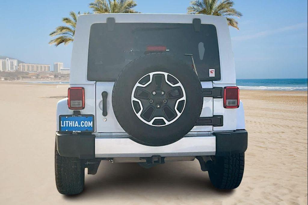 used 2014 Jeep Wrangler Unlimited car, priced at $16,388