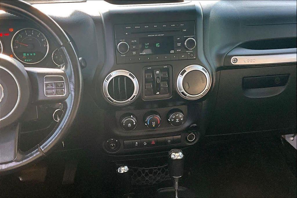 used 2014 Jeep Wrangler Unlimited car, priced at $16,388