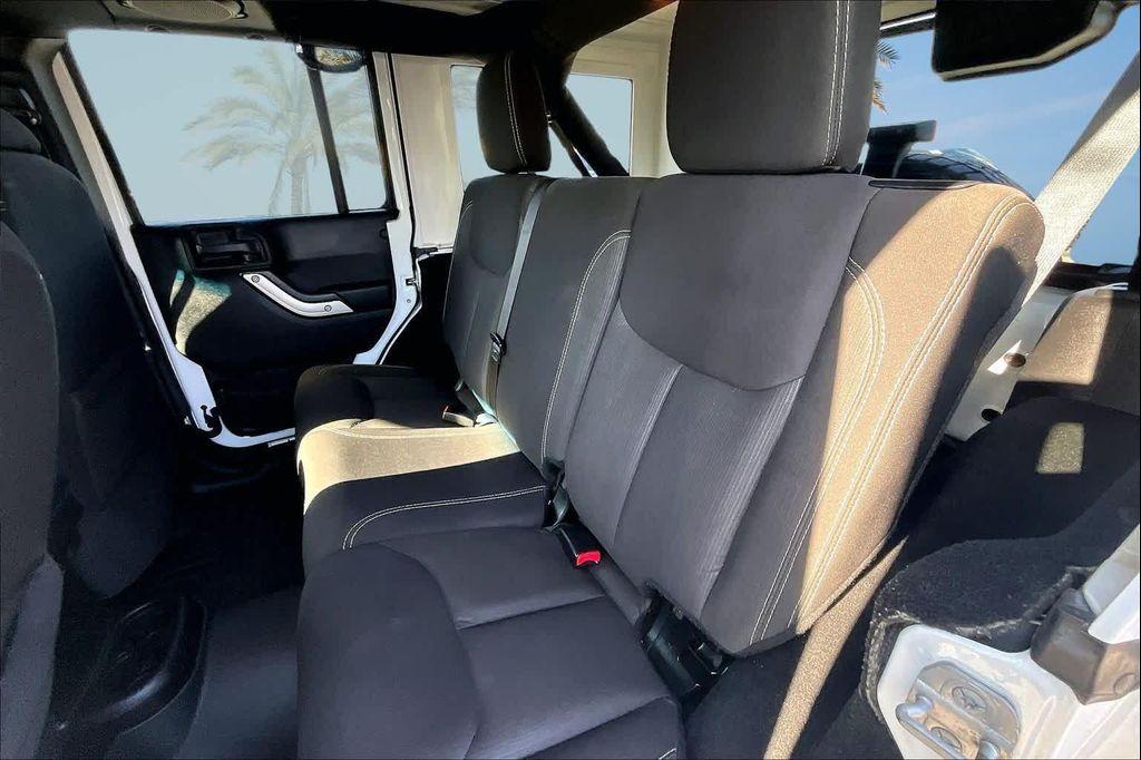 used 2014 Jeep Wrangler Unlimited car, priced at $16,388