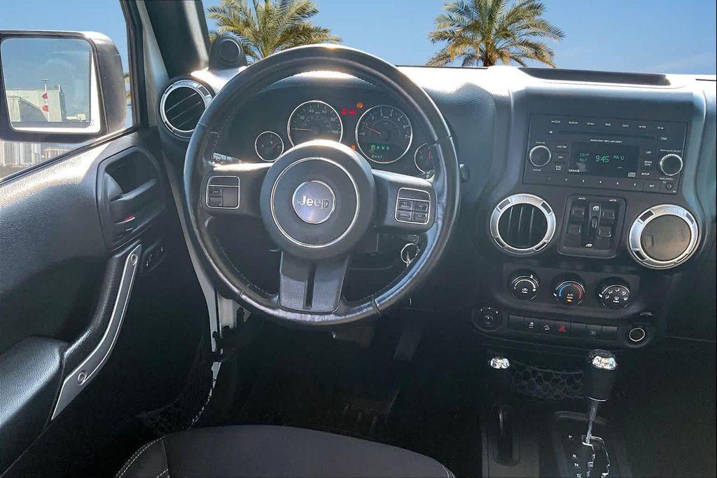used 2014 Jeep Wrangler Unlimited car, priced at $16,388