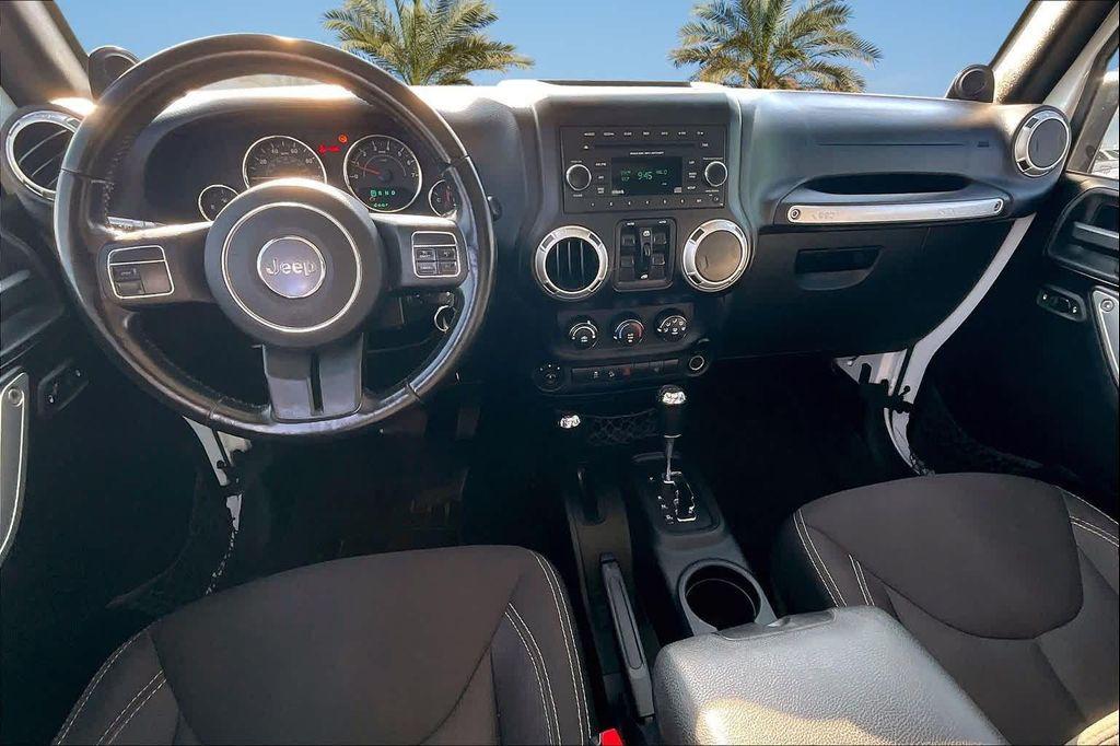 used 2014 Jeep Wrangler Unlimited car, priced at $16,388