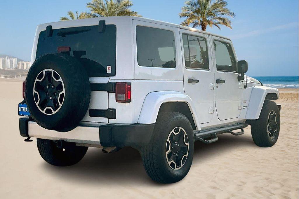 used 2014 Jeep Wrangler Unlimited car, priced at $16,388