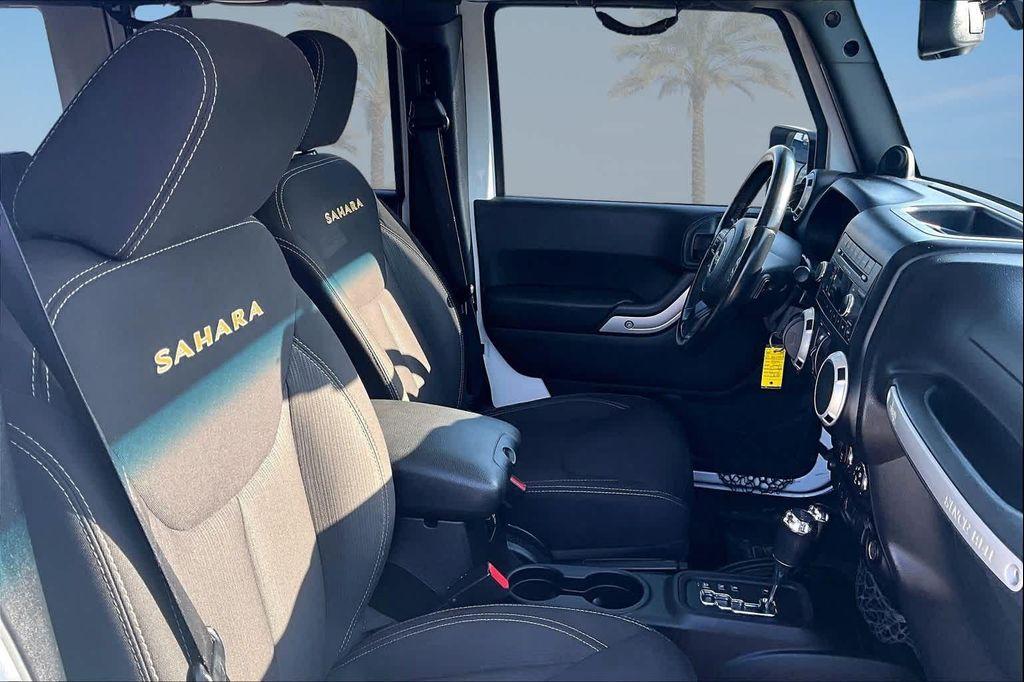 used 2014 Jeep Wrangler Unlimited car, priced at $16,388