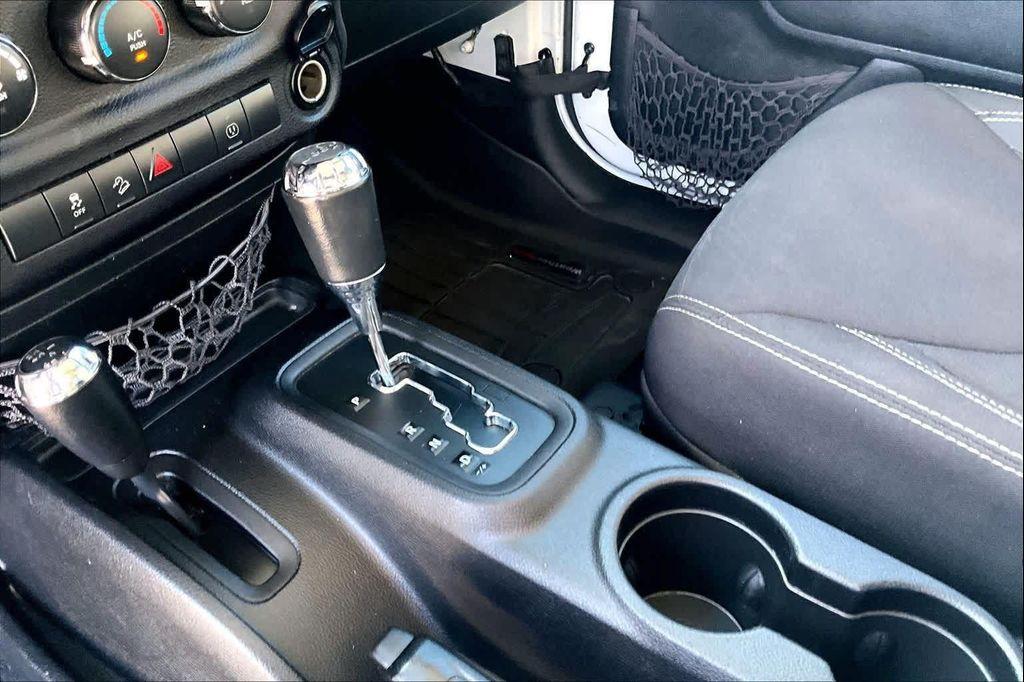 used 2014 Jeep Wrangler Unlimited car, priced at $16,388