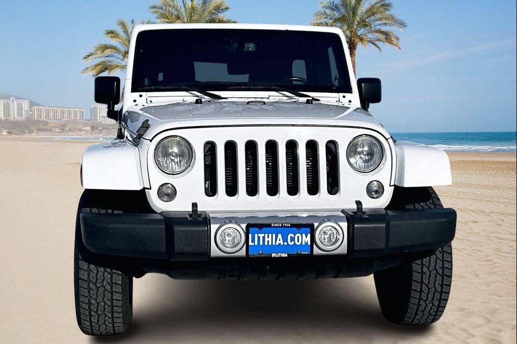 used 2014 Jeep Wrangler Unlimited car, priced at $16,388