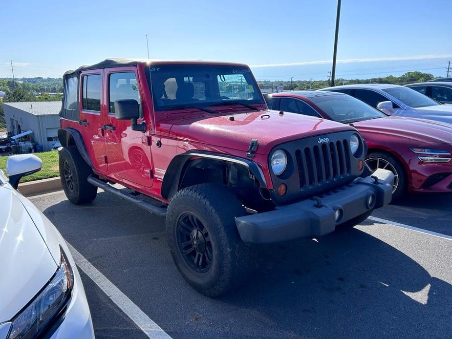 used 2011 Jeep Wrangler Unlimited car, priced at $15,700