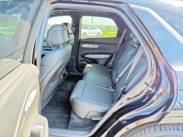 used 2025 Genesis GV70 car, priced at $56,057
