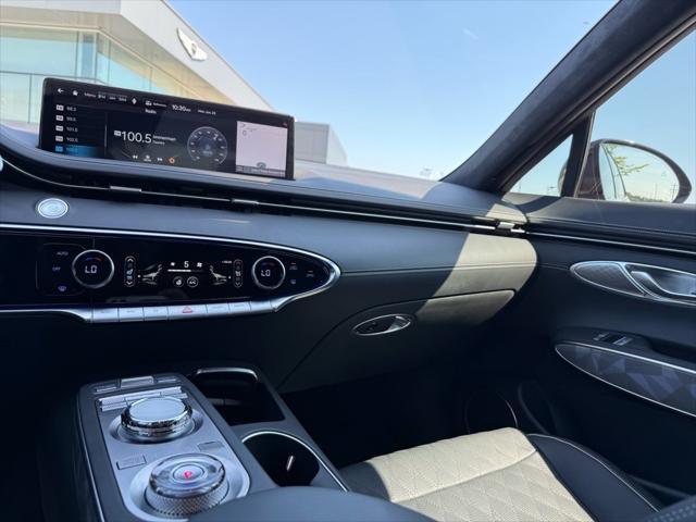 used 2025 Genesis GV70 car, priced at $56,057
