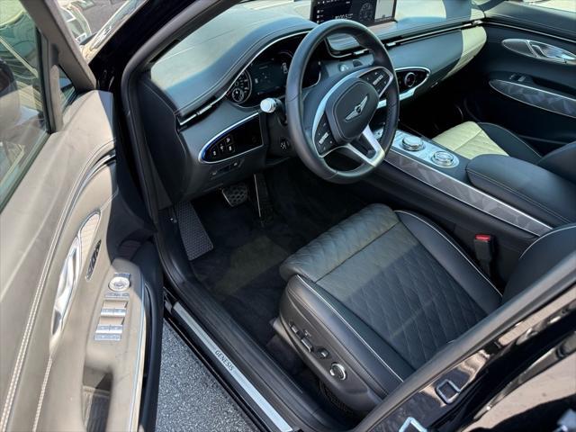used 2025 Genesis GV70 car, priced at $56,057