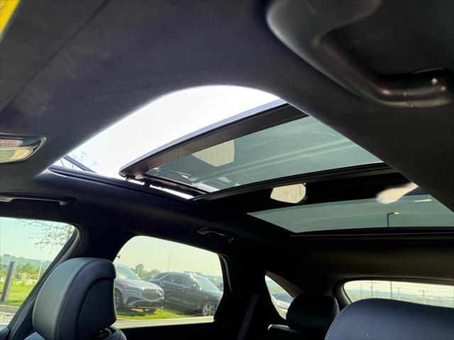 used 2025 Genesis GV70 car, priced at $56,057